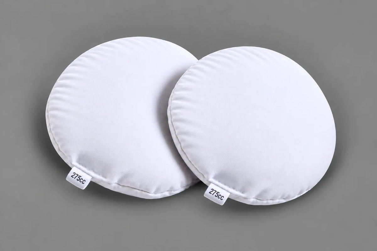 A pair of 275cc breast implant sizers, designed for personal use.