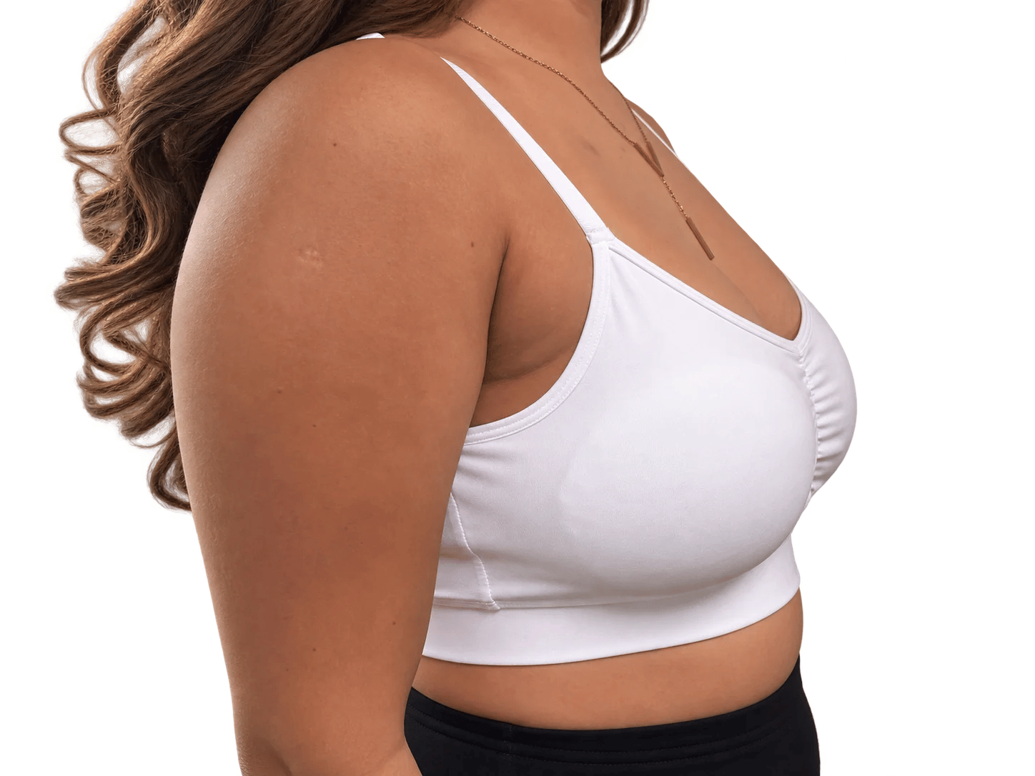 Model wearing 450cc Oumènta breast implant sizers