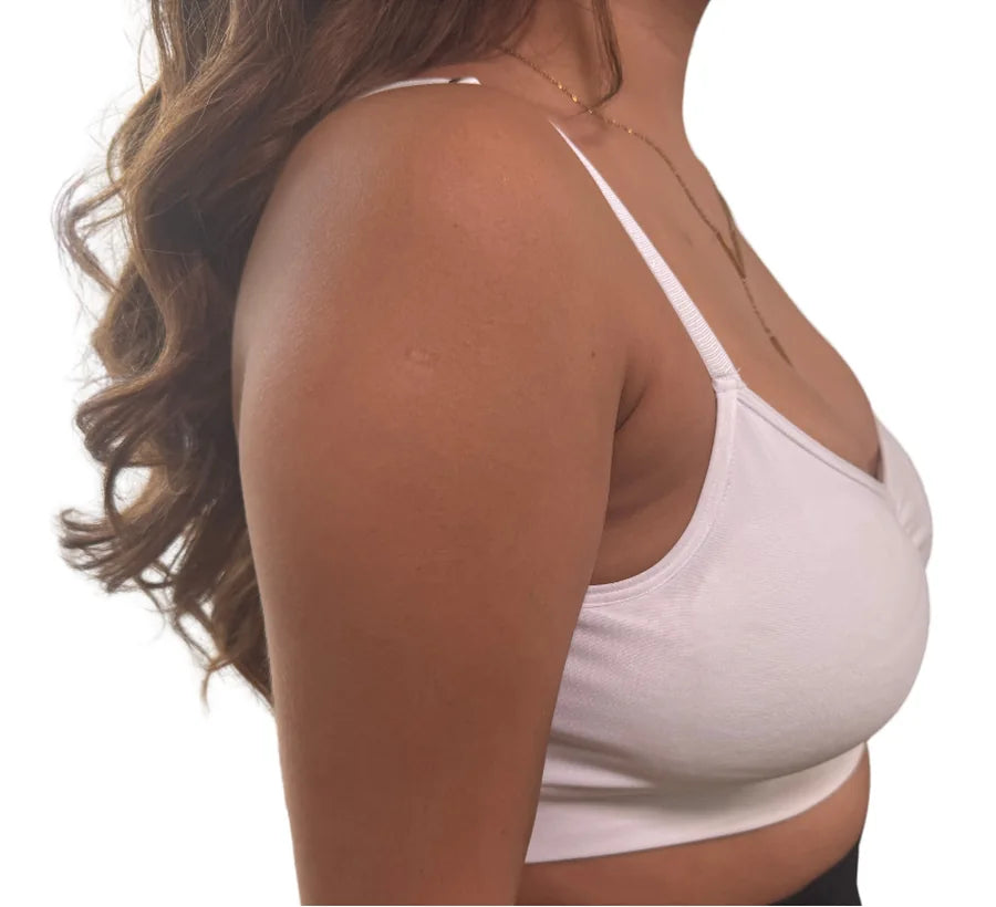 Model wearing 500cc Oumènta breast implant sizers